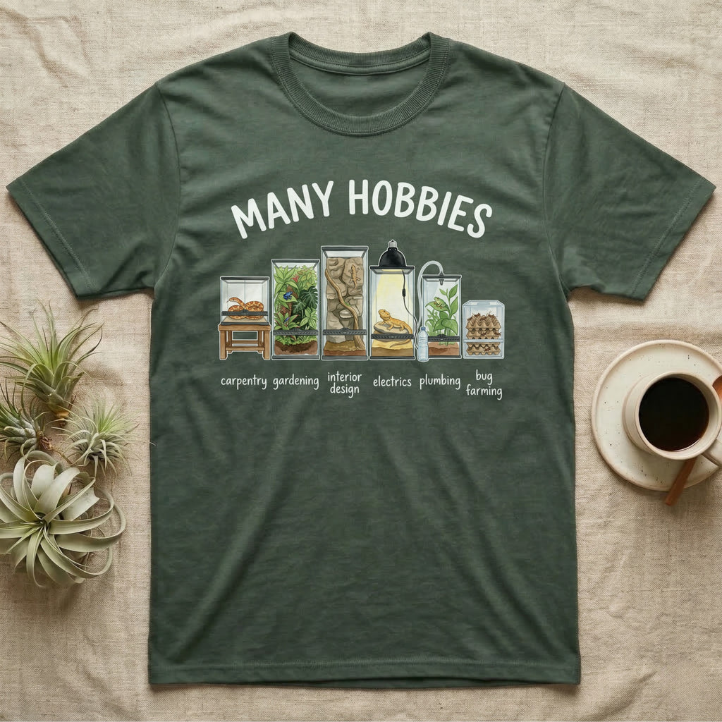 Reptile Terrarium Hobbies T-Shirt in Military Green — Watercolour row of reptile vivariums with a snake, dart frog, gecko, bearded dragon, tree frog and a cricket bin under MANY HOBBIES, each labelled carpentry to bug farming