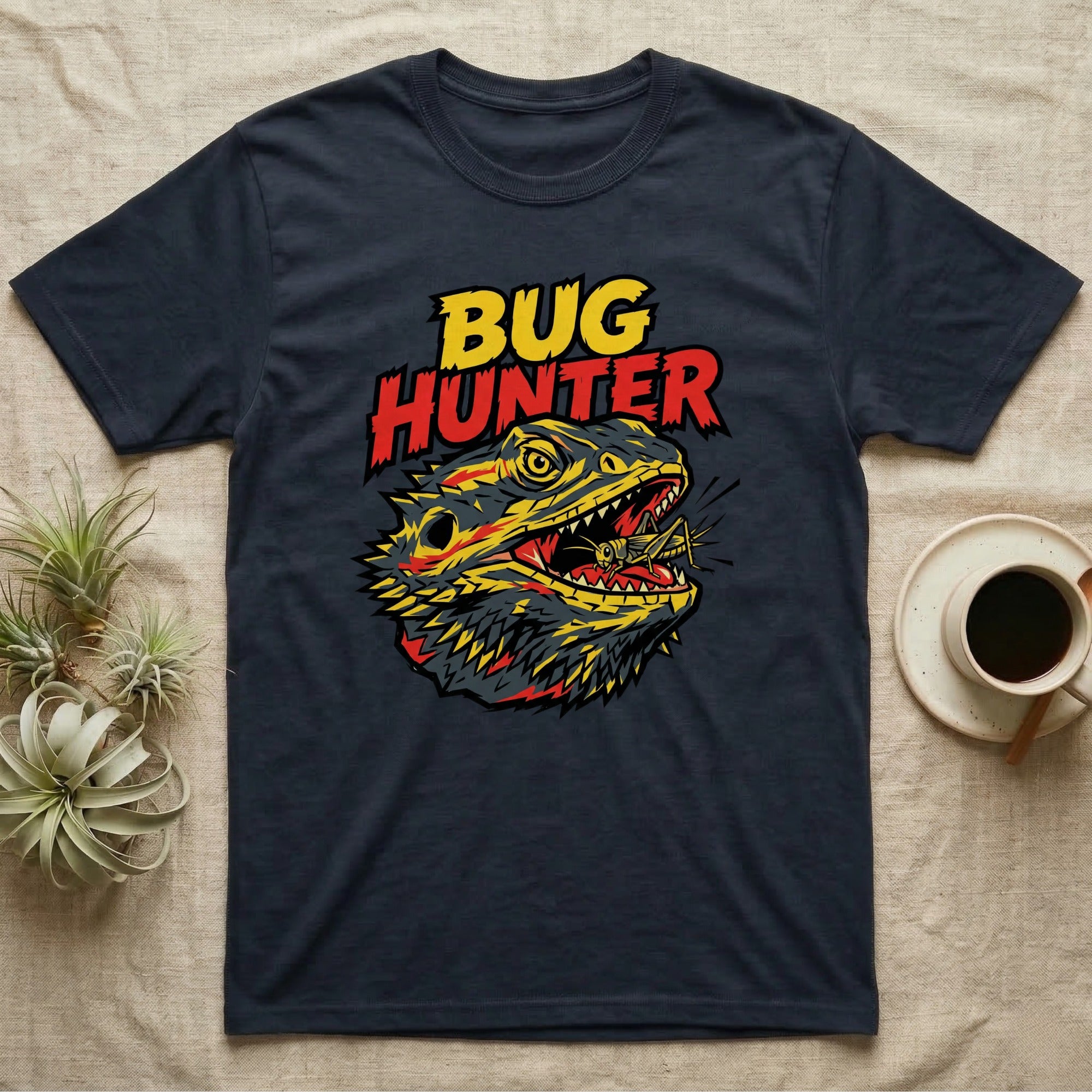 Dark t-shirt with yellow and red "BUG HUNTER" text and a dragon eating an insect.