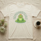 T-shirt with cartoon frog wearing a crown on a lily pad.