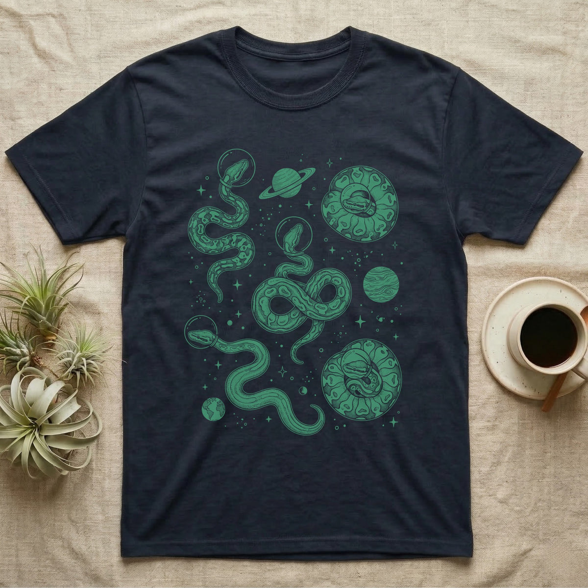 Ball Python Cosmic T-Shirt in Navy — Vintage screen-print illustration of ball pythons in astronaut helmets floating in space, deep emerald green monochromatic on dark background.