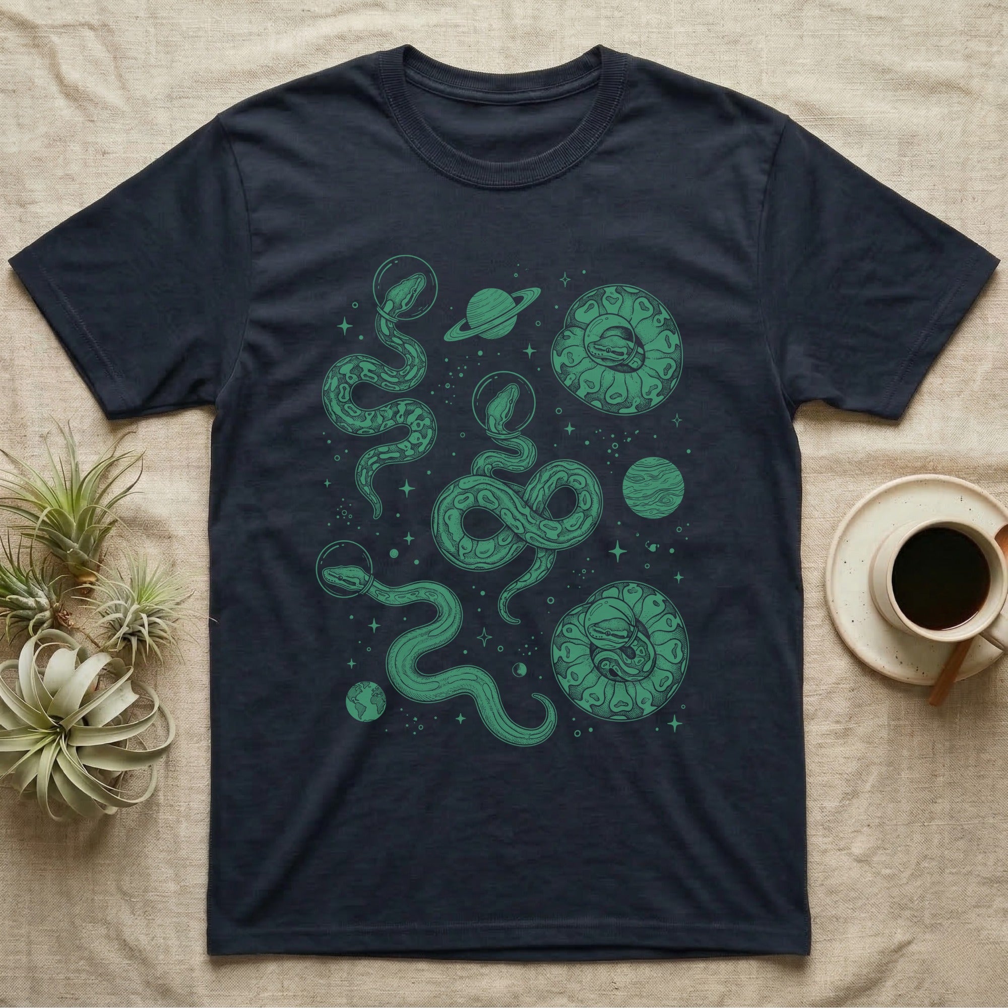 Ball Python Cosmic T-Shirt in Navy — Vintage screen-print illustration of ball pythons in astronaut helmets floating in space, deep emerald green monochromatic on dark background.
