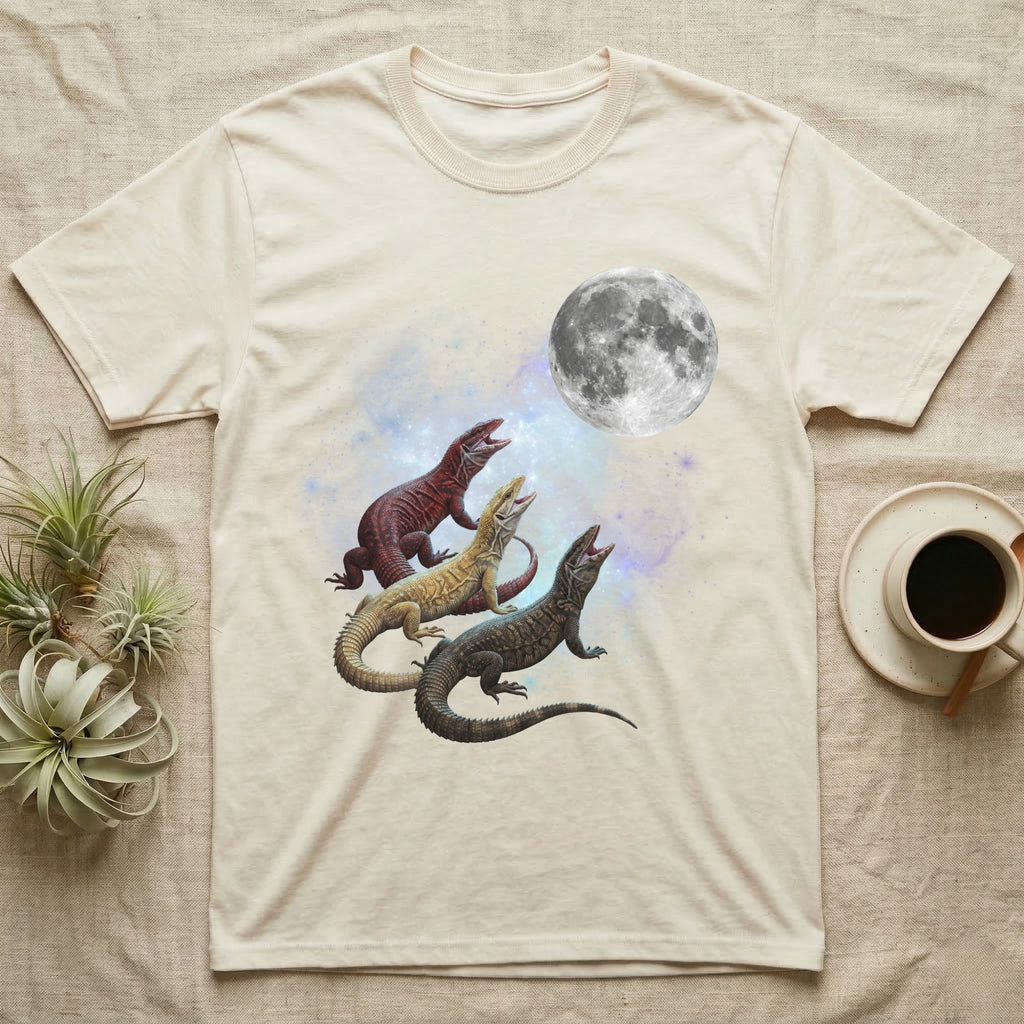 Ackie Monitor Moon Howl T-Shirt in Natural — Three Ackie Monitor colour morphs howling at a full moon over a nebula on a dark grey t-shirt.