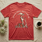 Milk Snake Scooter T-Shirt in Heather Red — Milk snake in a white cap riding a kick scooter with a baby snake in a sling, under the curved words Out for MILK, don't wait up.