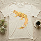 Uromastyx Solar Loaf T-Shirt in Natural — Warm watercolour mosaic of a basking uromastyx lizard made of tiny suns, cacti and sand on grey