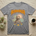Central Bearded Dragon Feral T-Shirt in Sport Grey — Baby bearded dragon in a pastel desert scene under a spiky amber metal wordmark reading HEADBANGER.