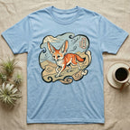 Light blue t-shirt with a cartoon fennec fox on a desert landscape.