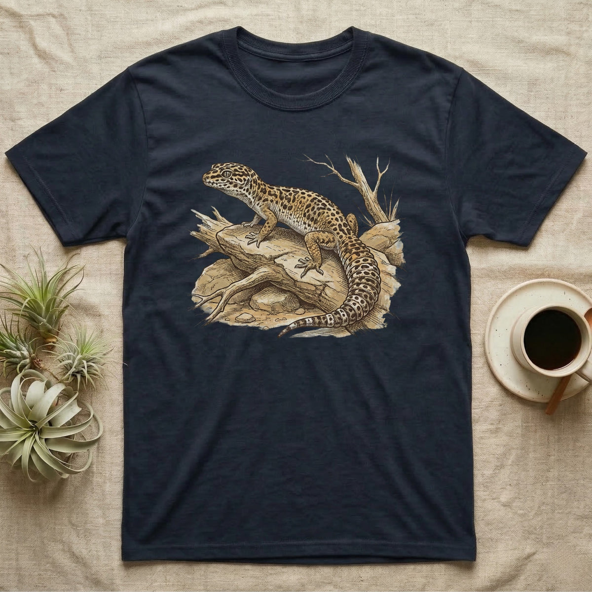 Navy t-shirt featuring a detailed illustration of a leopard gecko on a rock.