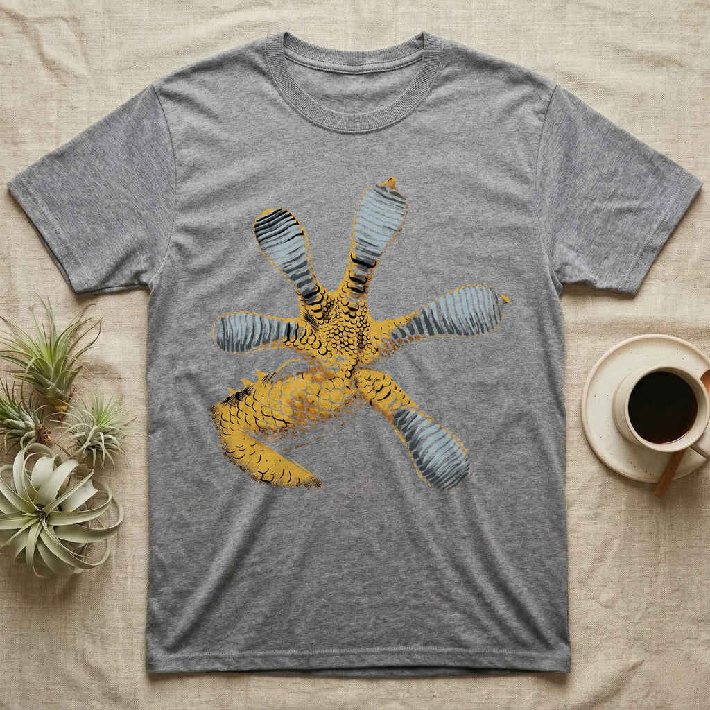 Macro illustration of a gecko's forefoot from underneath, ribbed blue-grey lamellae toe pads fanned against amber-gold scale texture, no on-shirt text. — shown on a Sport Grey tee.