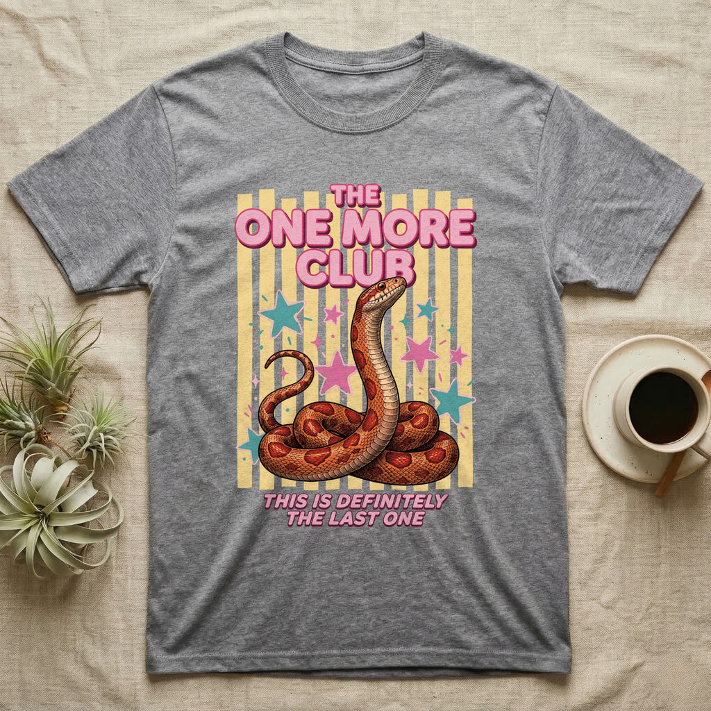 Corn Snake Club T-Shirt in Sport Grey — Engraved corn snake sitting deadpan under pink lettering The One More Club, with This is definitely the last one below, on yellow stripes