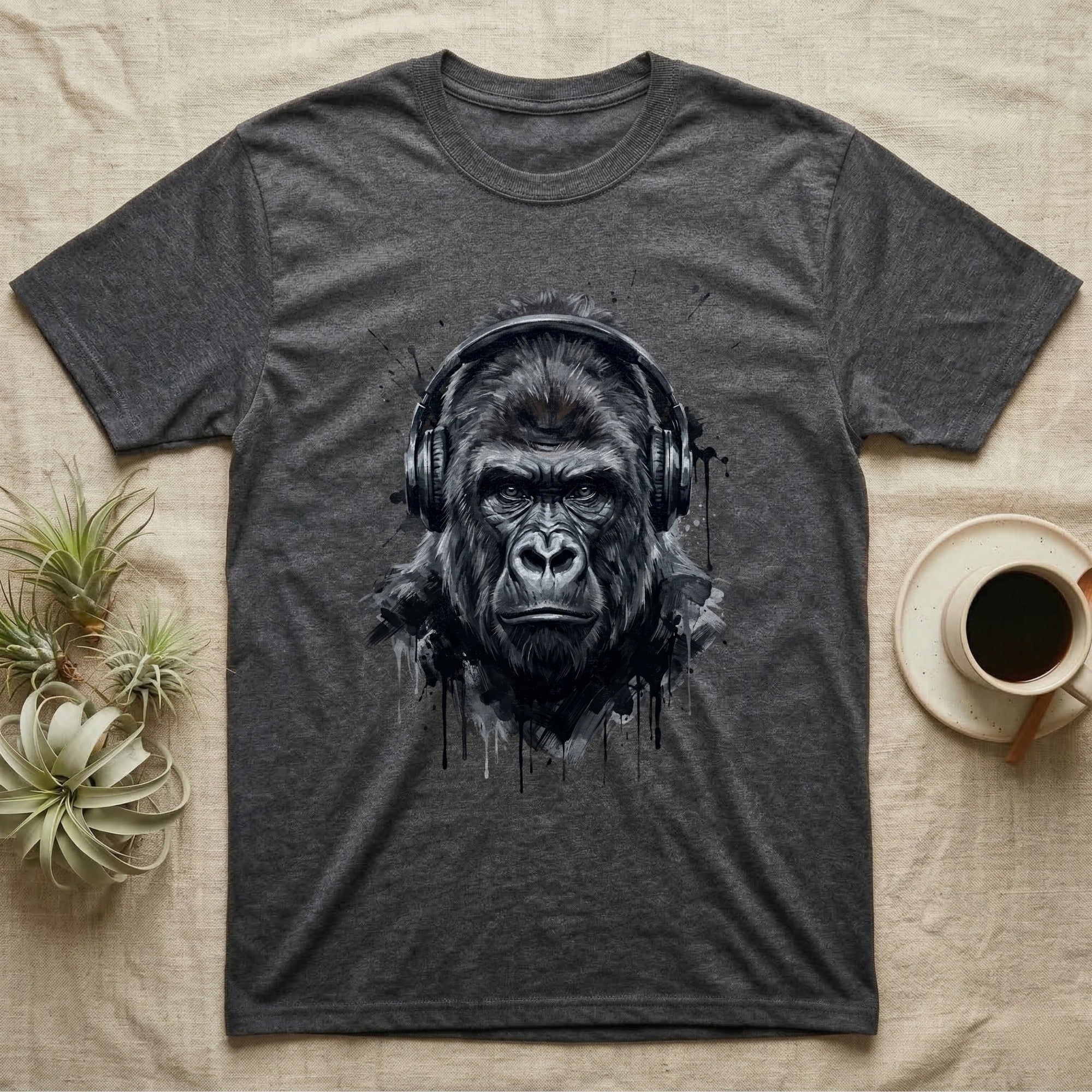 Dark t-shirt with a grayscale gorilla wearing headphones graphic.