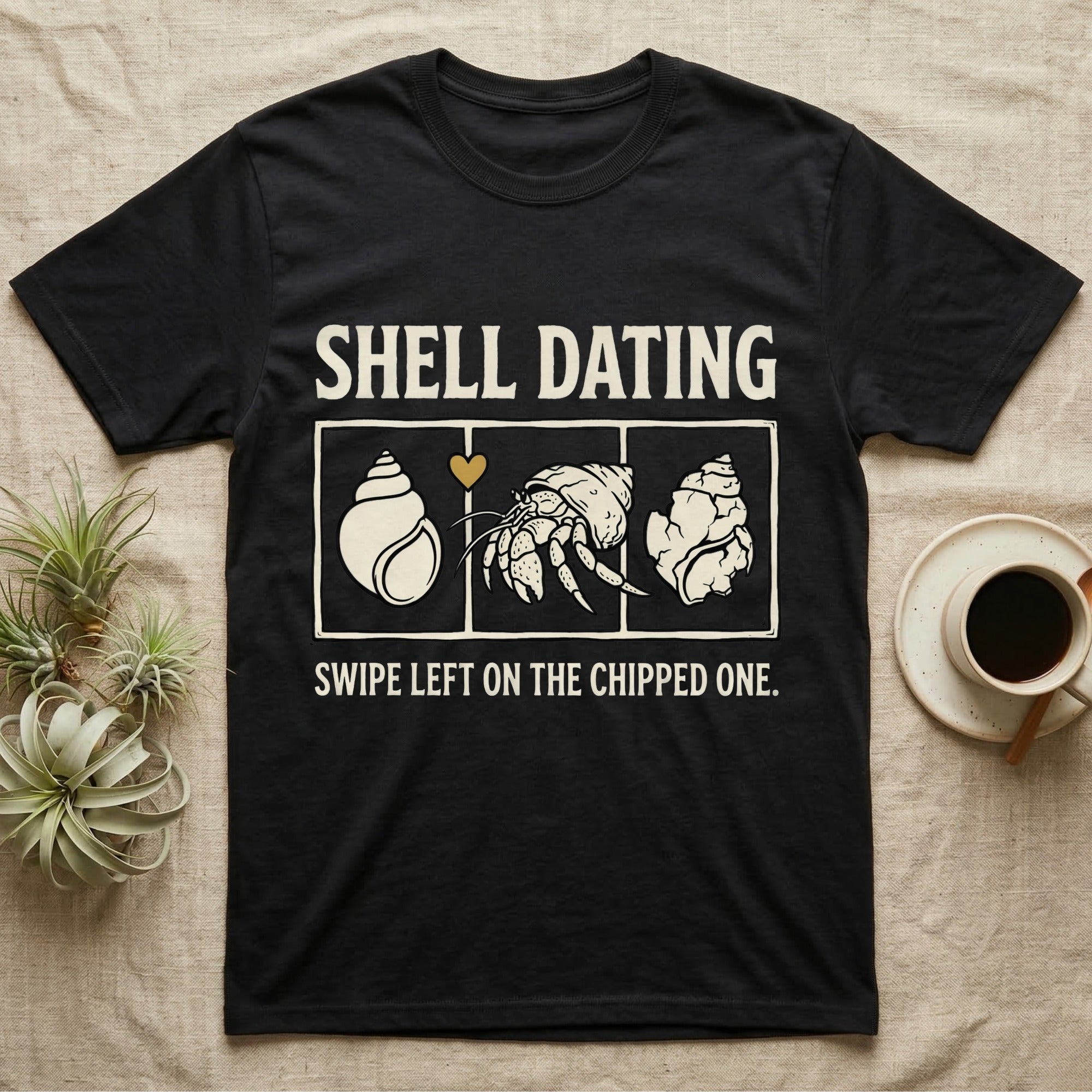 Hermit Crab Shell Dating T-Shirt in Black — Vintage-ink hermit crab leaning toward a pristine shell, chipped shell on the right, carved type "Shell Dating. Swipe Left."