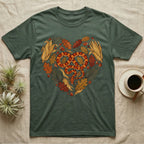Green t-shirt with a snake and autumn leaves forming a heart.