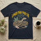 Reticulated Python Feral T-Shirt in Navy — Reticulated python in net-patterned coils under jagged molten-gold metal text LONGER THAN YOUR CAR with pastel ferns