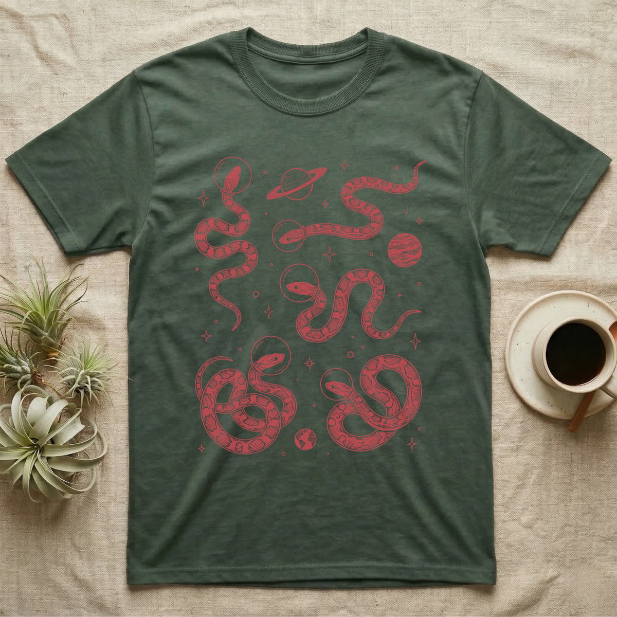 Corn Snake Cosmic T-Shirt in Military Green — Vintage screen-print illustration of corn snakes in astronaut helmets floating in space, cosmic crimson monochromatic on dark background.
