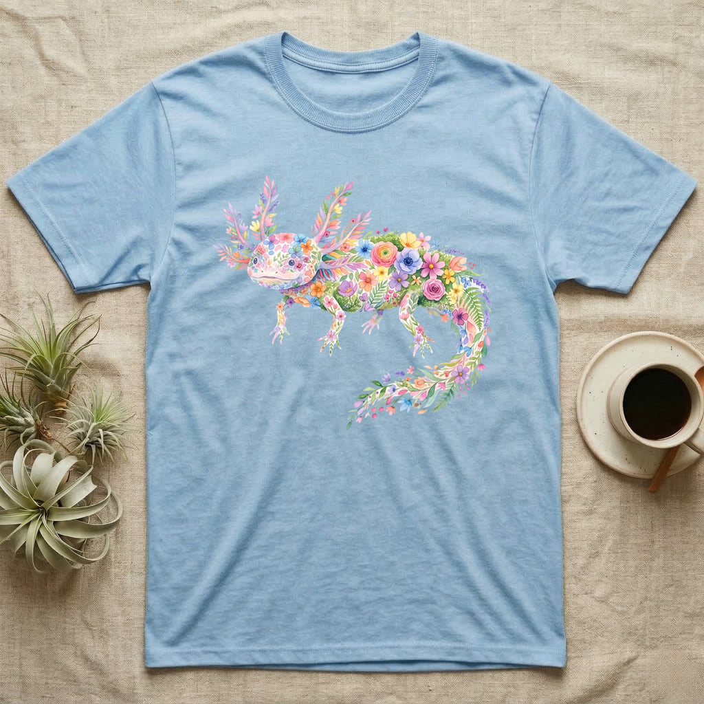 Axolotl Watercolour Mosaic T-Shirt in Light Blue — Watercolour mosaic axolotl made of painted flowers and leaf blades, gill plumes fanned, petals trailing from its tail