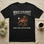 Reptile Roach Colony T-Shirt in Black — Vintage engraving of a dubia roach lounging in a camp chair with coffee under arched text What Colony on charcoal grey
