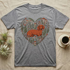 Grey t-shirt with a heart-shaped woodland design featuring a dachshund.