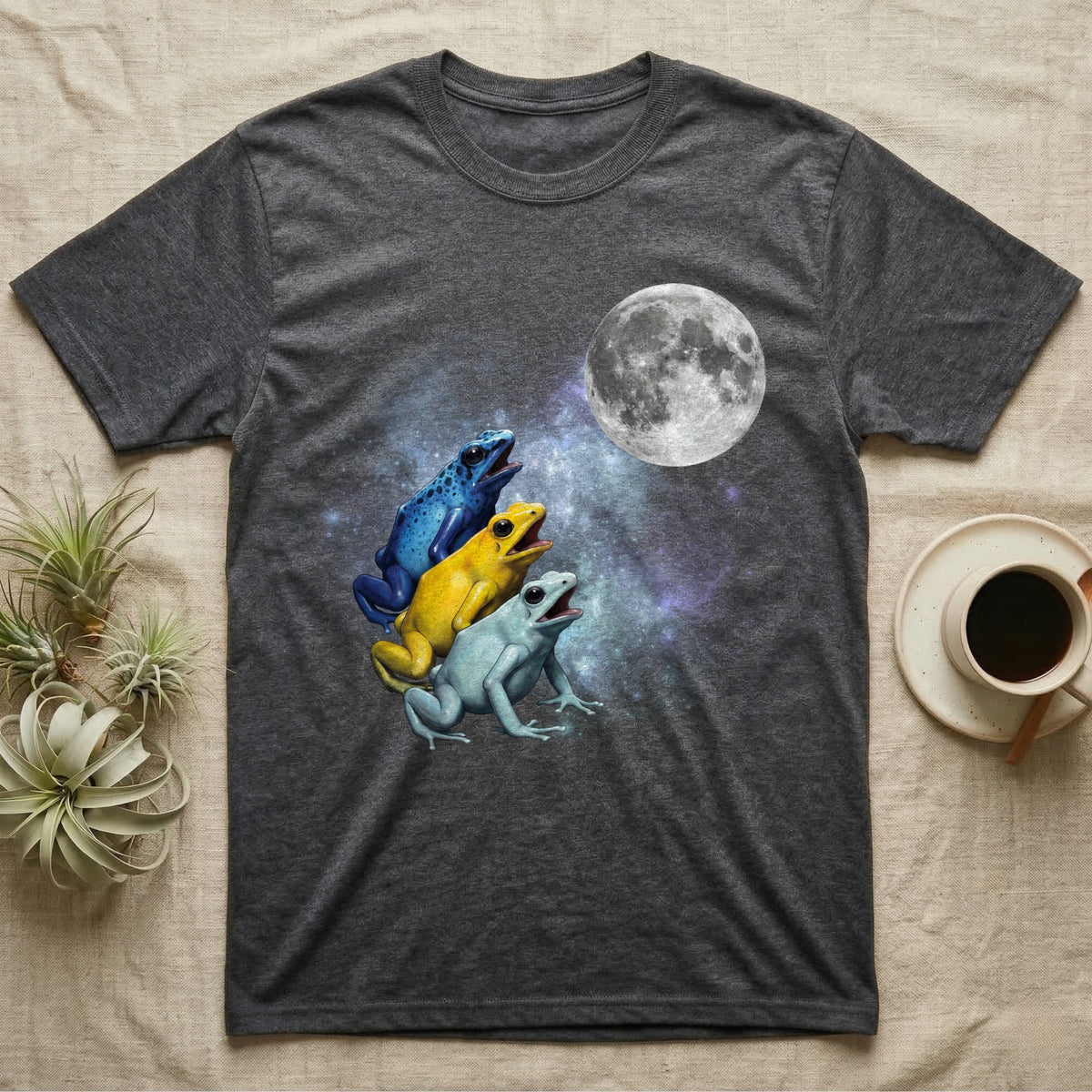 Poison Dart Frog Moon Howl T-Shirt in Dark Heather — Three Poison Dart Frog colour morphs howling at a full moon over a nebula on a dark grey t-shirt.