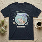 Navy t-shirt with a cartoon axolotl in a jar with "soft & slimy & sweet" text.