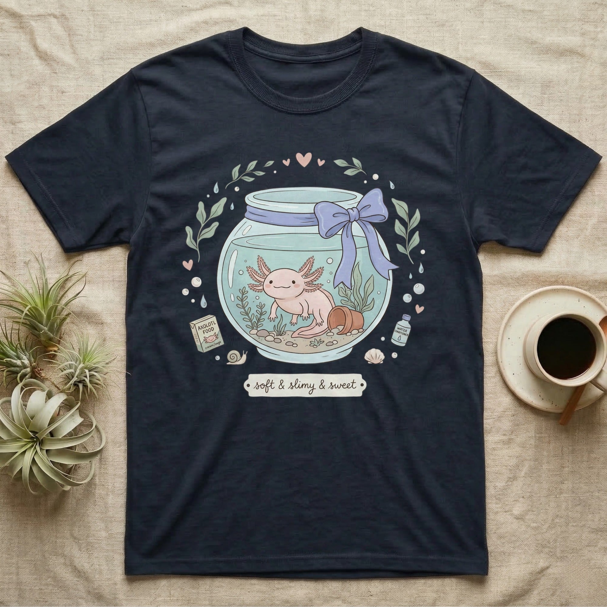Navy t-shirt with a cartoon axolotl in a jar with "soft & slimy & sweet" text.