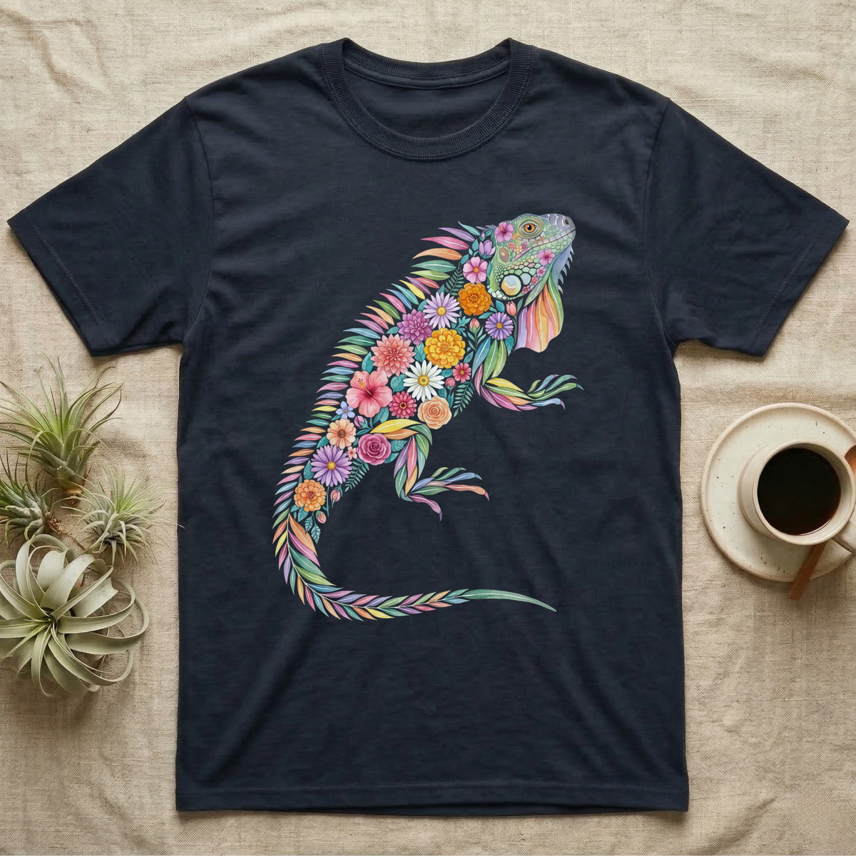 Green Iguana Floral Mosaic T-Shirt in Navy — Watercolour green iguana climbing, its whole body built from painted hibiscus, dandelion and leaf shapes.
