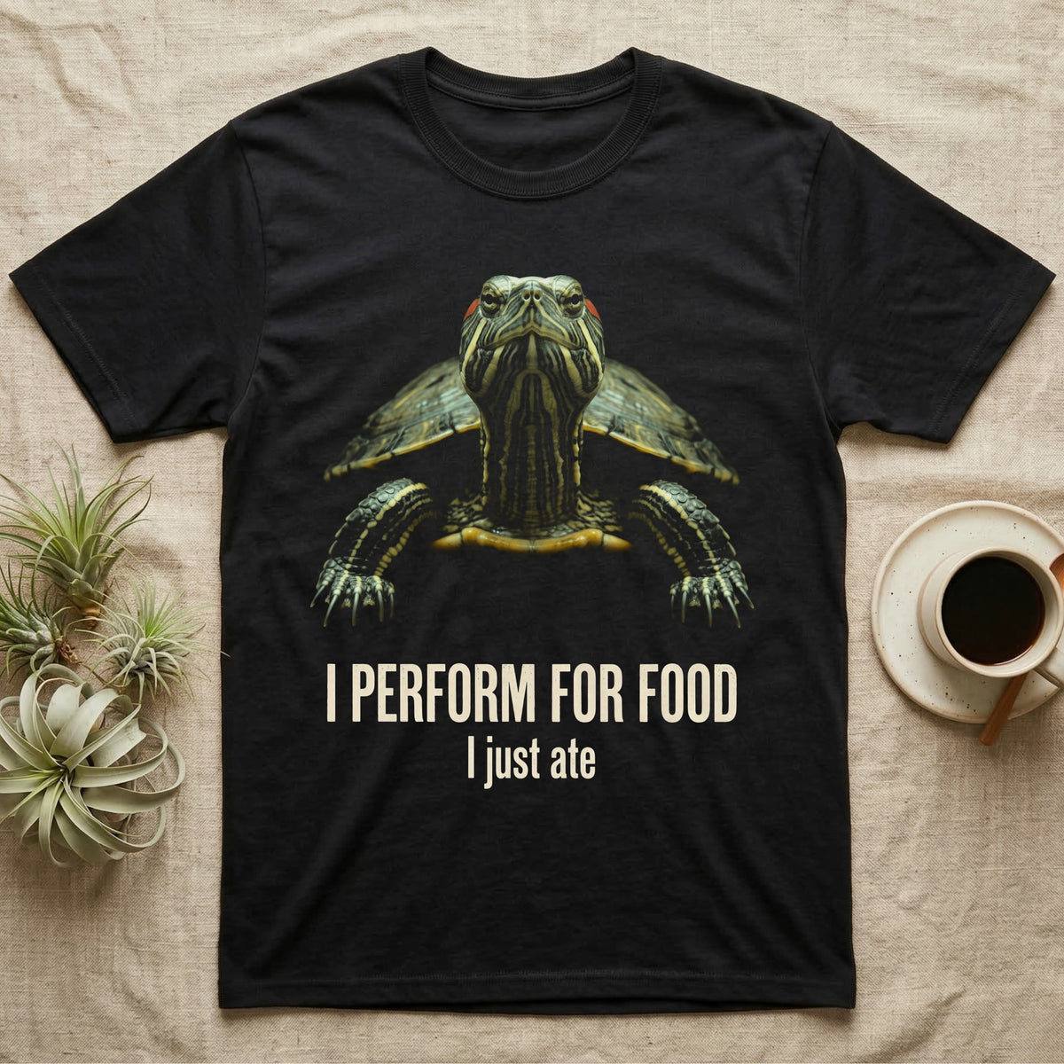 Flat-black mug-shot portrait of a red-eared slider turtle stretching its neck toward the camera, with the printed words I Perform For Food, I just ate. — shown on a Black tee.