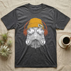 Green Iguana Headphones T-Shirt in Dark Heather — Engraved green iguana with jowls and dorsal spines in a beanie and headphones, aviators reflecting a rainforest.