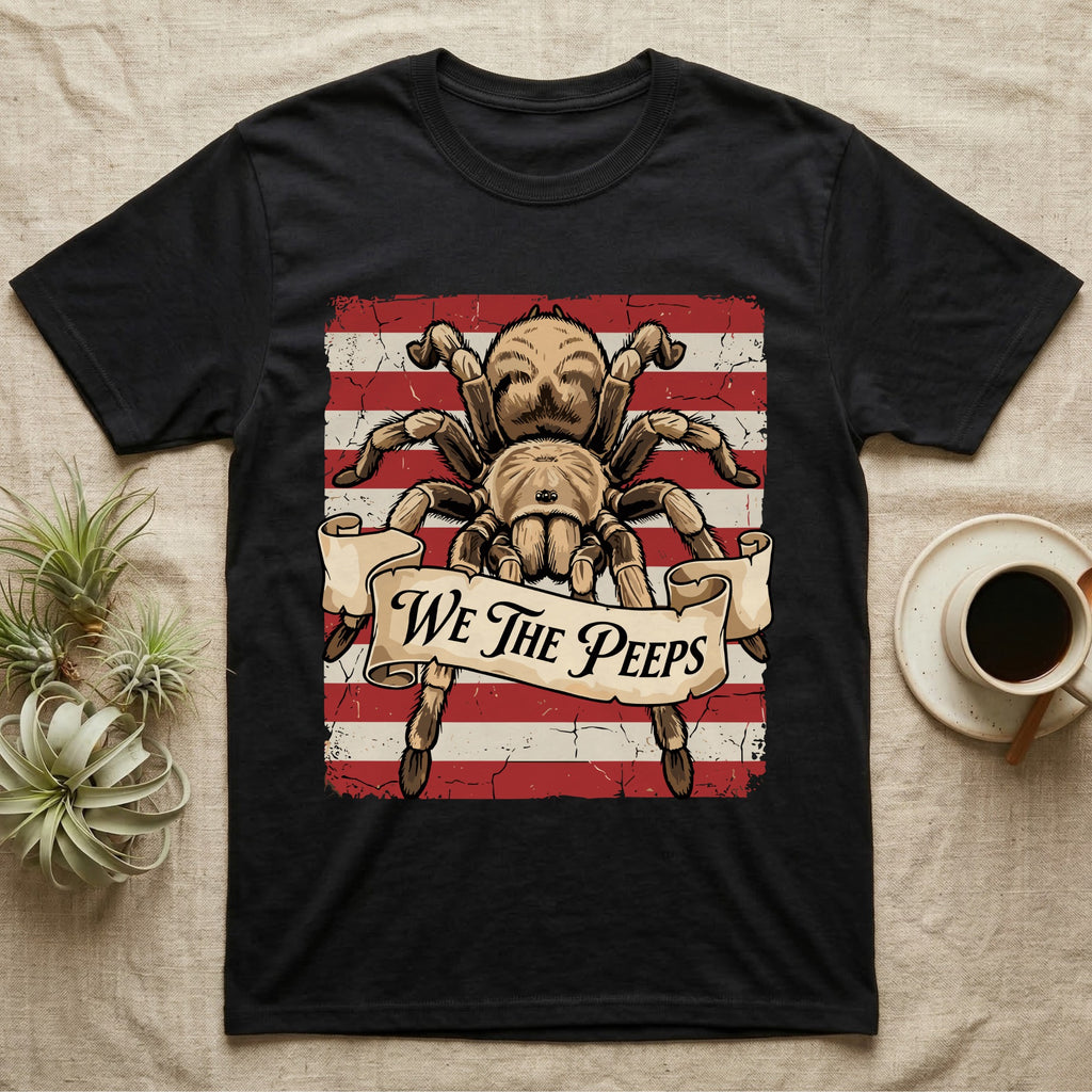 Tarantula We The Peeps T-Shirt in Black — Detailed tarantula over a distressed striped flag holding a banner scroll reading We The Peeps.