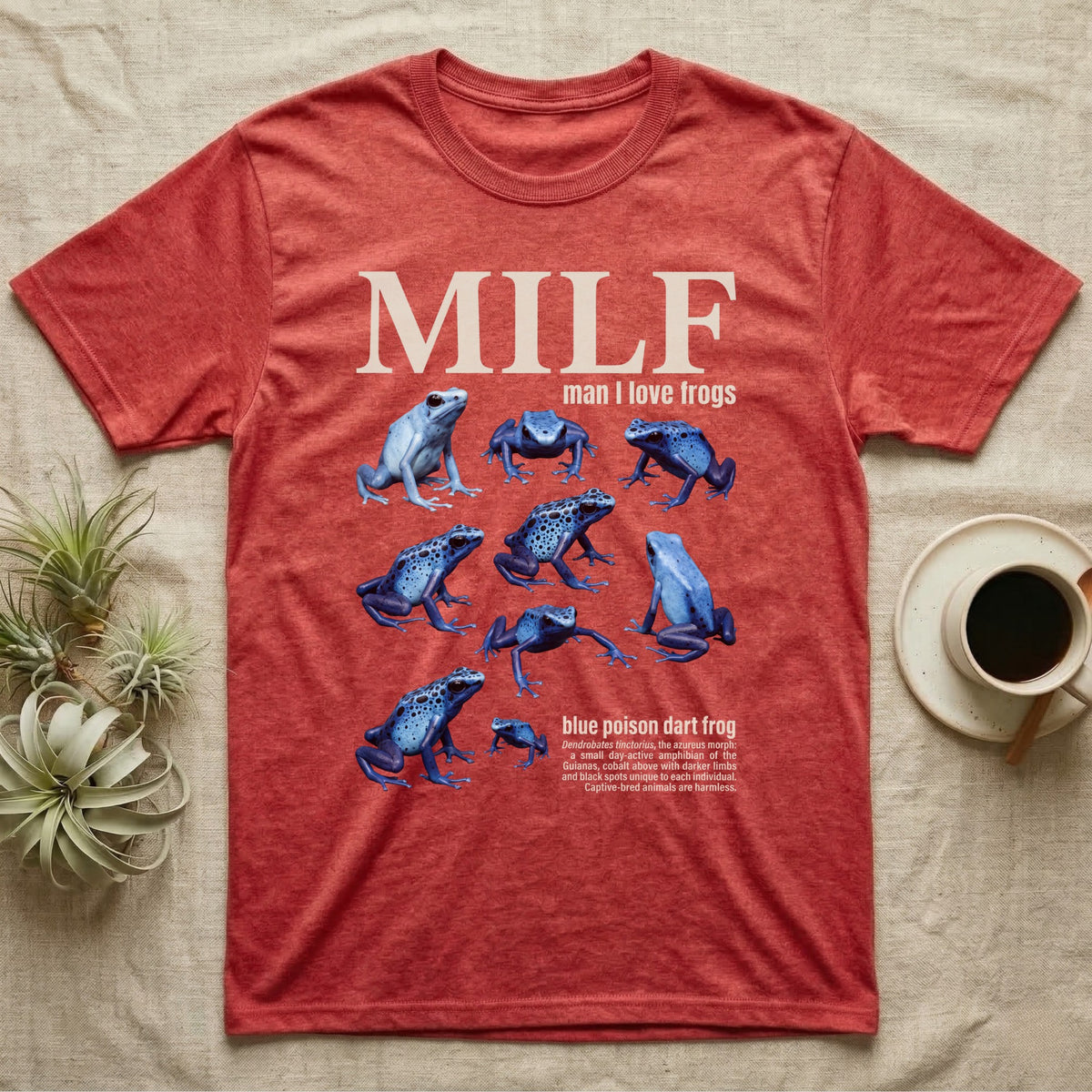 Blue Poison Dart Frog T-Shirt in Heather Red — Eight blue poison dart frogs in a cut-out photo collage beneath the huge cream word MILF on grey.