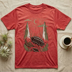 Cubaris Isopod Home Range T-Shirt in Heather Red — Woodcut-style illustration of a Cubaris isopod walking across leaf litter with cypress knees and saplings behind, no on-shirt text.