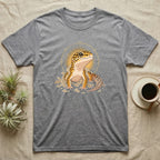 Leopard Gecko Shed T-Shirt in Sport Grey — Bold vector illustration of a leopard gecko emerging fresh from a shed, lit by a soft warm halo glow.