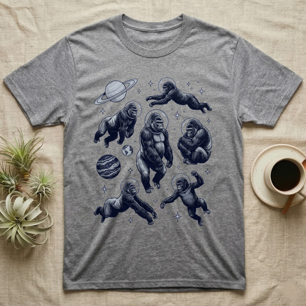 T-shirt with multiple gorillas in space, planets, and stars.