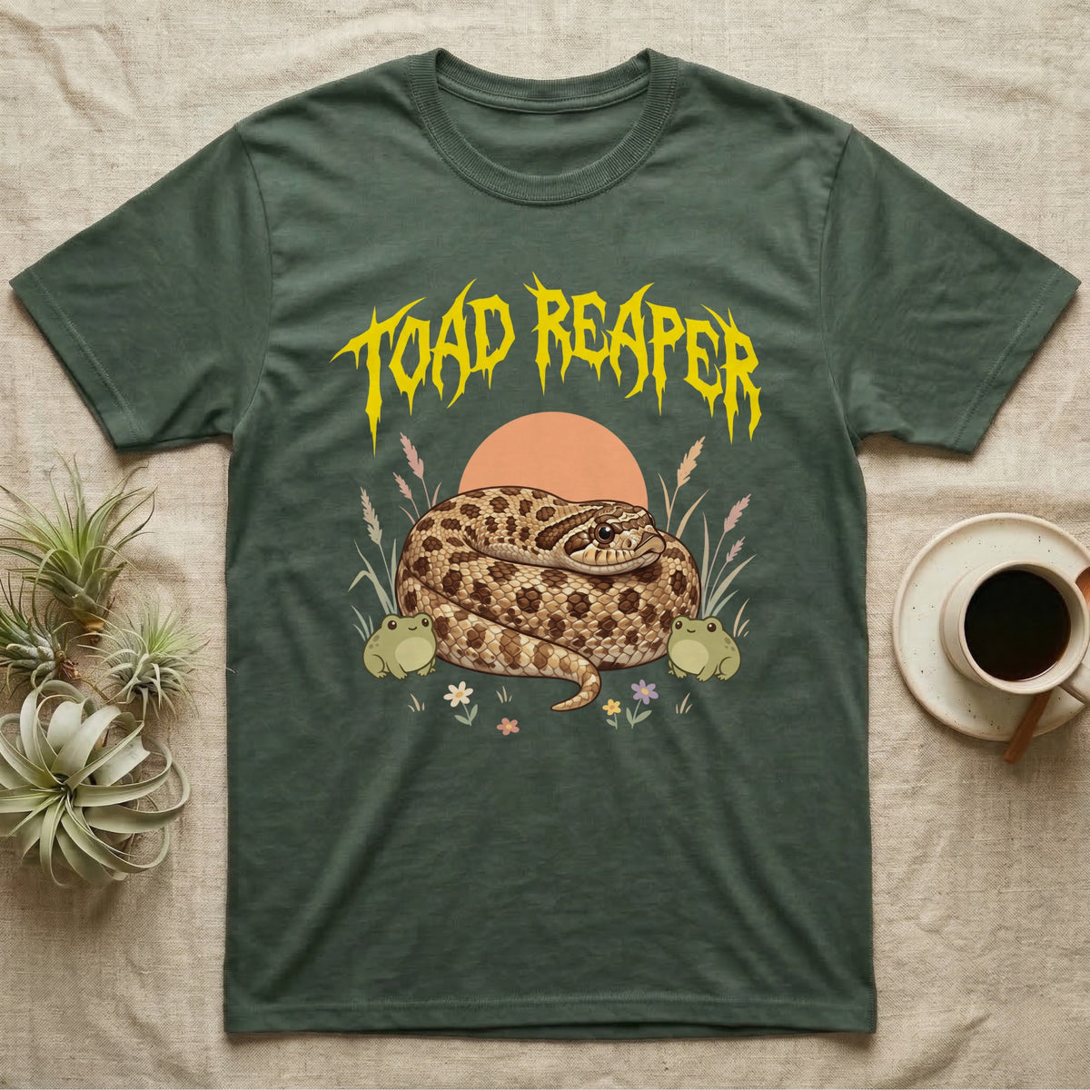 Hognose Toad Reaper T-Shirt in Military Green — Realistic western hognose coiled in a loaf between two cartoon toads under jagged yellow lettering: TOAD REAPER