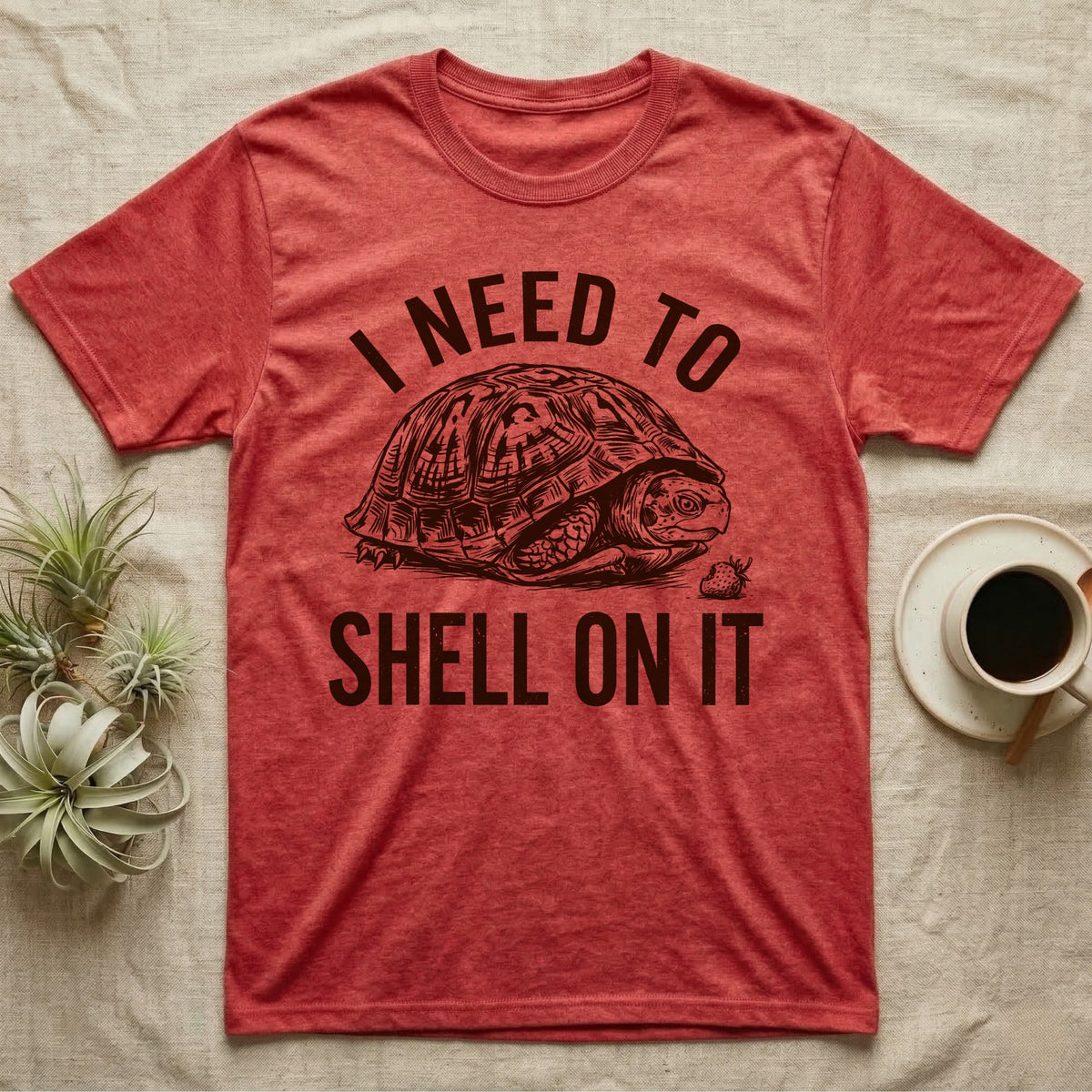 Box Turtle Overthinker T-Shirt in Heather Red — Etching of a box turtle half-closed in its shell beside a strawberry, under I NEED TO, above SHELL ON IT