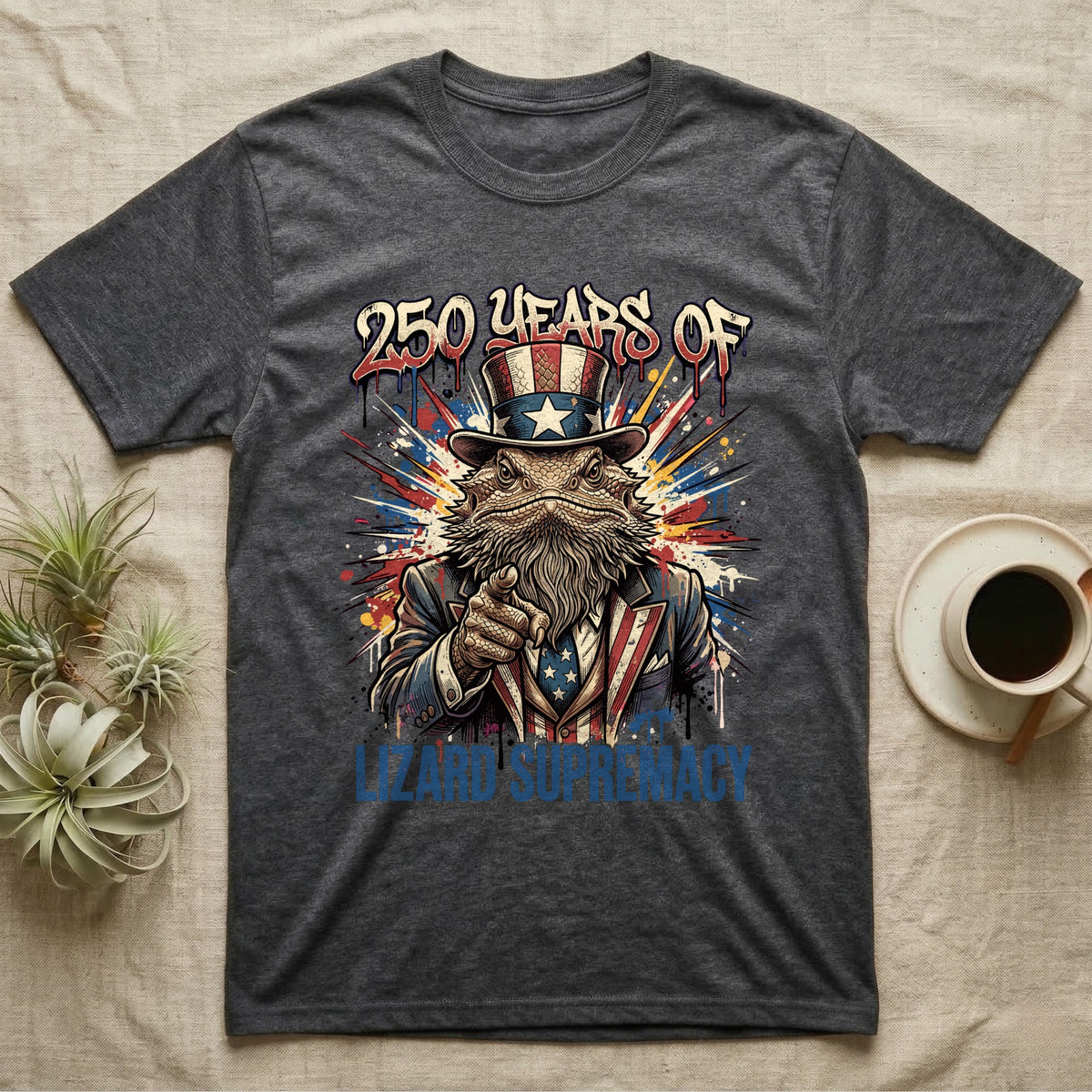 Bearded Dragon Uncle Sam T-Shirt in Dark Heather — Splatter-art bearded dragon as Uncle Sam pointing forward under text 250 Years of Lizard Supremacy.