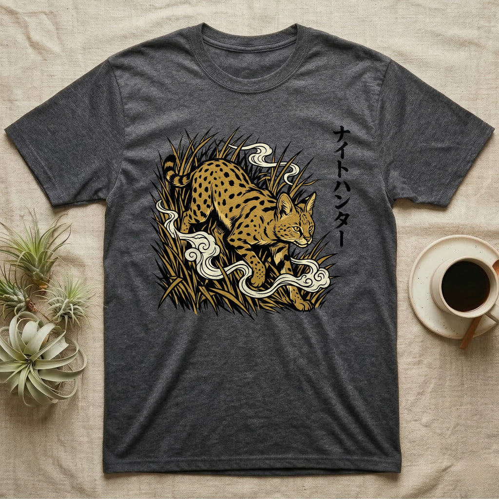 Dark gray t-shirt with a graphic of a spotted cat amidst grass and smoke, featuring Japanese text.