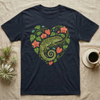 Dark t-shirt with a green lizard and coral flowers forming a heart.