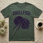 Hermit Crab Shellfish T-Shirt in Military Green — Worn purple one-ink print of a hermit crab hugging a big spare shell to its chest under the word Shellfish