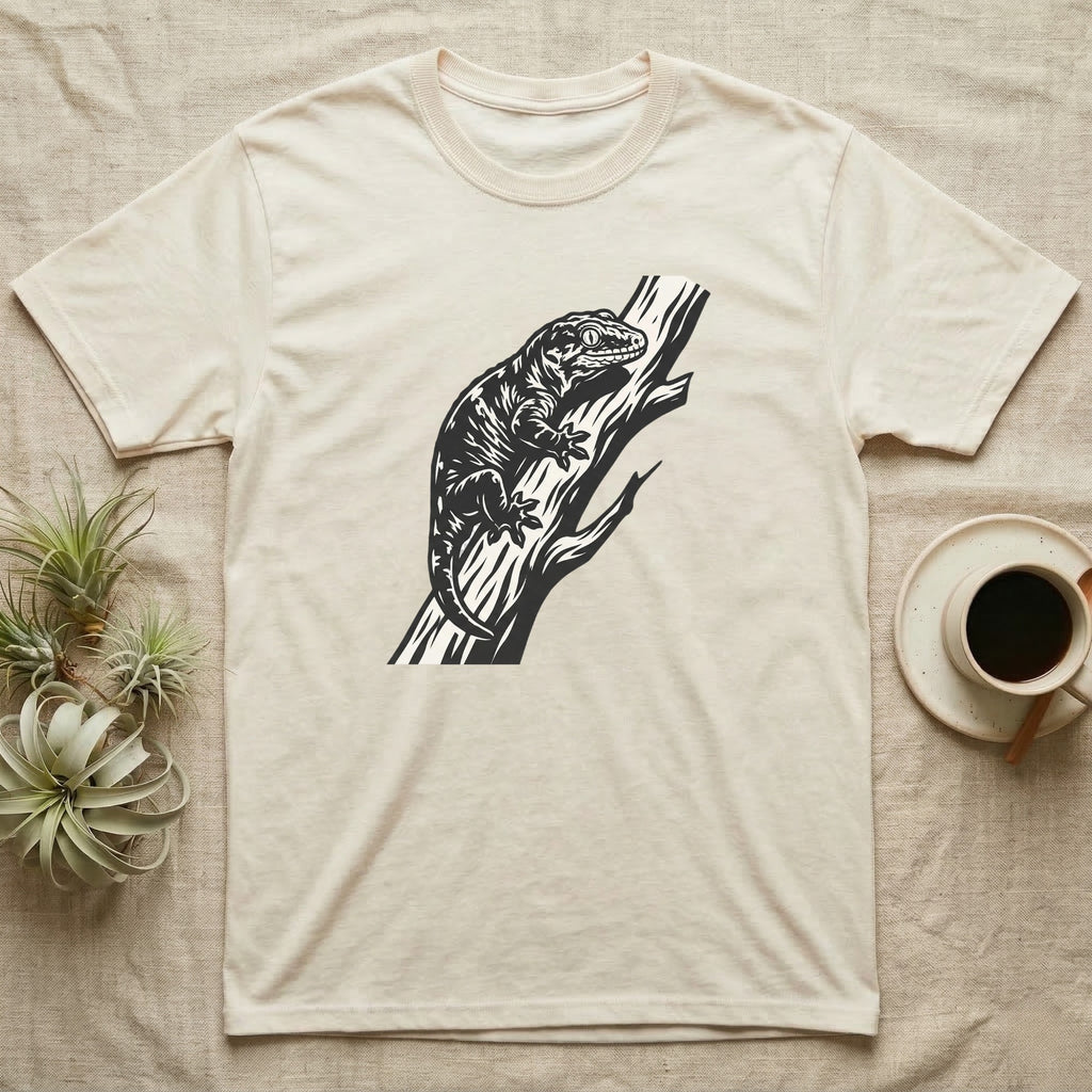 Cream t-shirt with black lizard graphic on a branch.