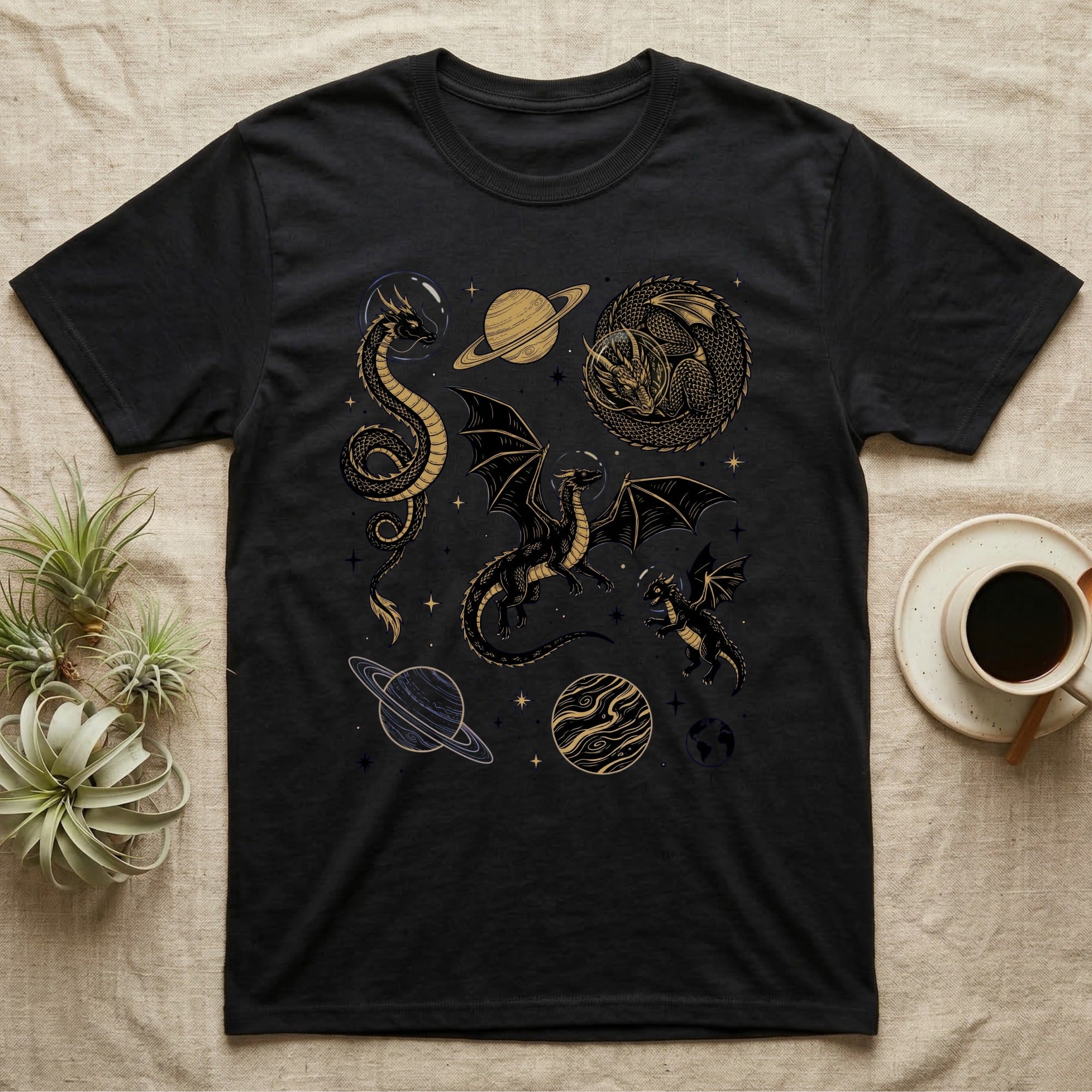 Black t-shirt with celestial dragon and planet designs.