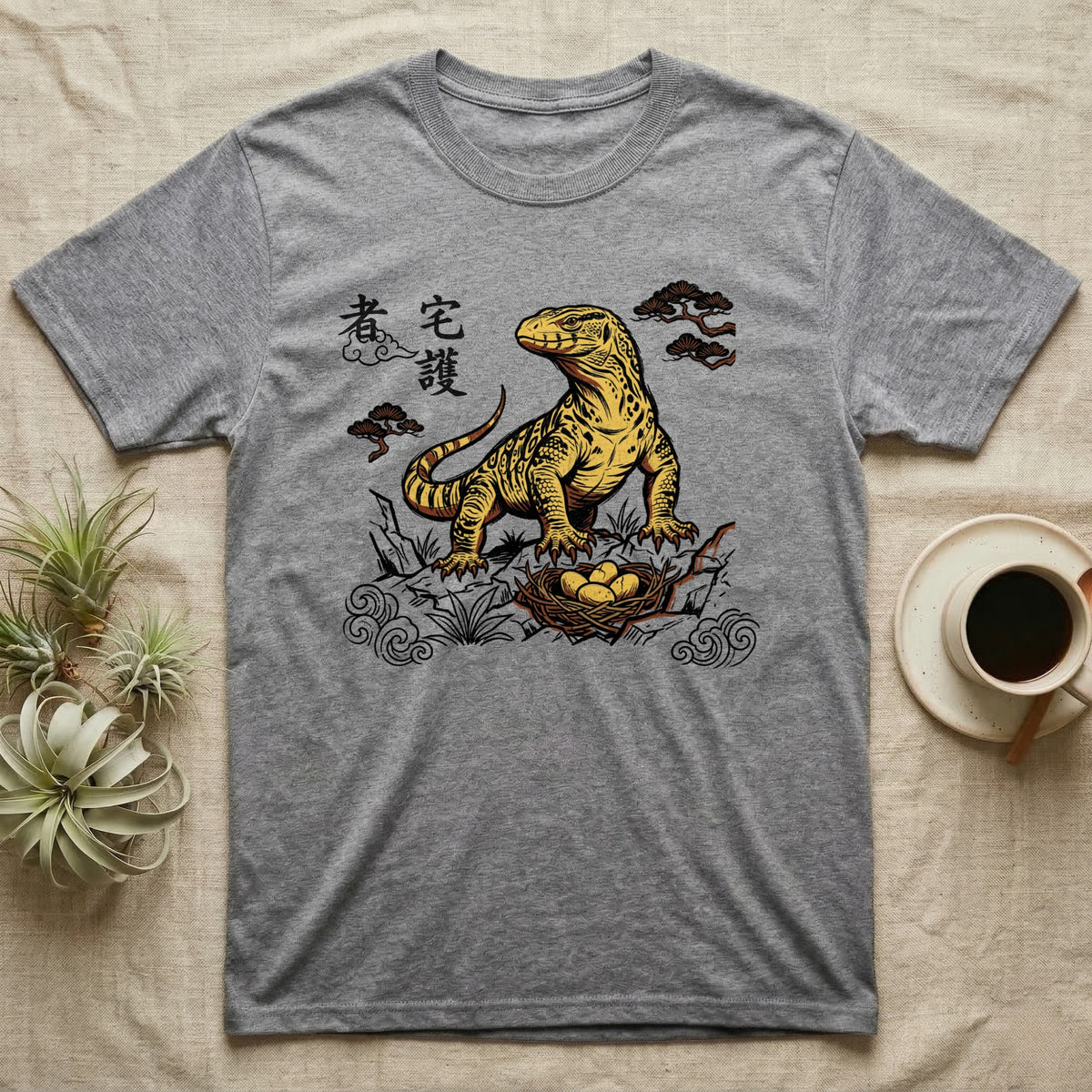 Grey t-shirt with Komodo dragon and nest design and Japanese text.