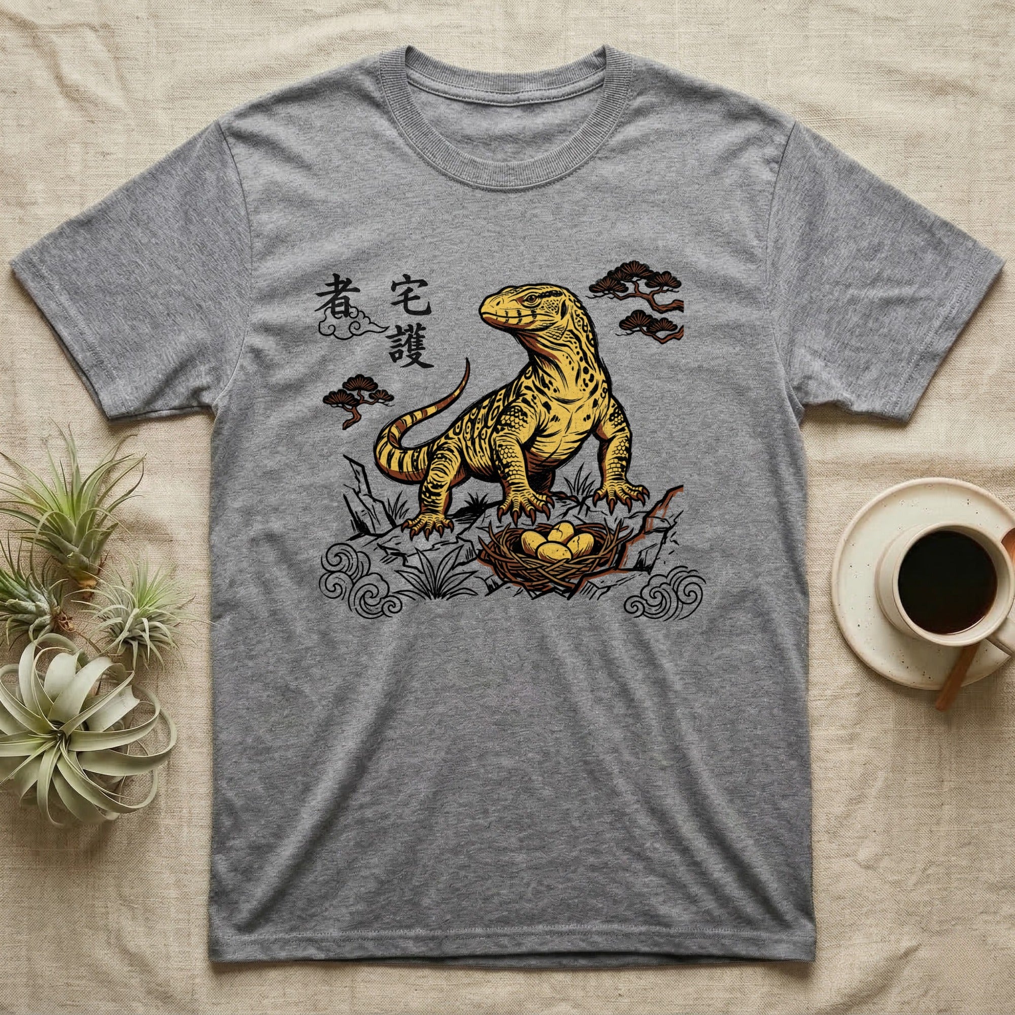 Grey t-shirt with Komodo dragon and nest design and Japanese text.