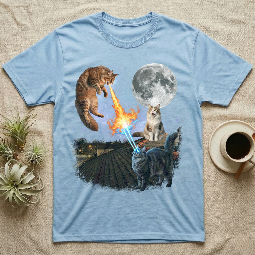 Light blue t-shirt with cats breathing fire and laser beams at the moon.
