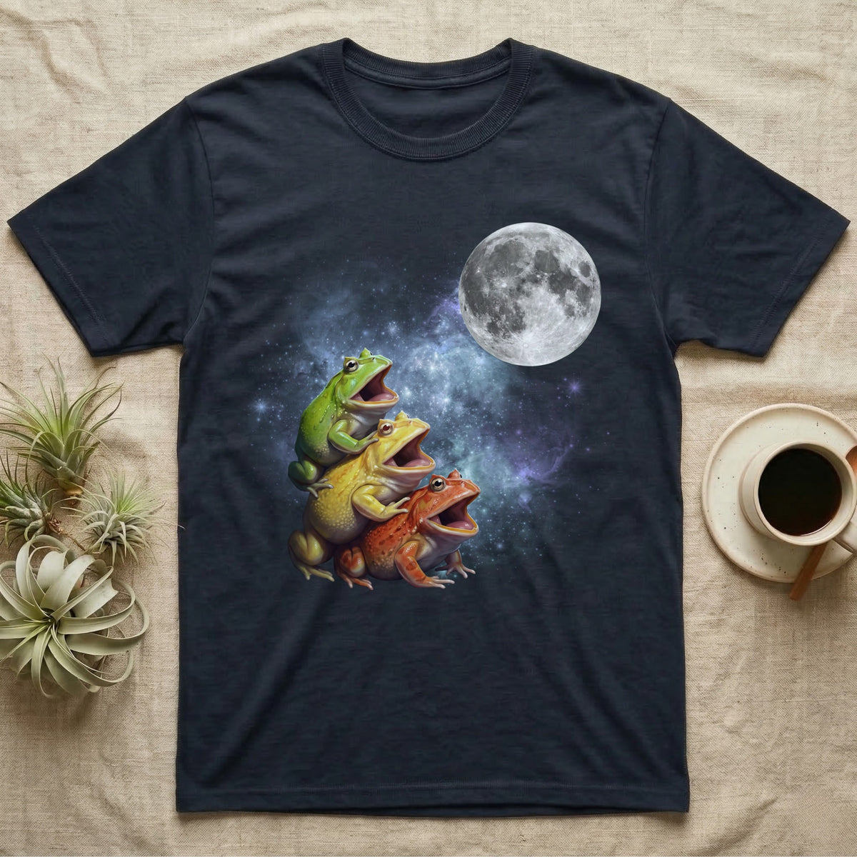 Pacman Frog Moon Howl T-Shirt in Navy — Three Pacman Frog colour morphs howling at a full moon over a nebula on a dark grey t-shirt.
