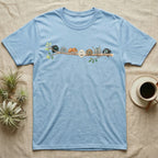Regal Jumping Spider Canopy Crew T-Shirt in Light Blue — Watercolor illustration of seven regal jumping spiders in colour morphs on a branch, dark grey T-shirt design.