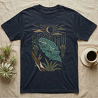 White's Tree Frog Home Range T-Shirt in Navy — Woodcut-style illustration of a White's tree frog resting on a broad wet leaf with reed stems and a crescent moon behind, no on-shirt text.