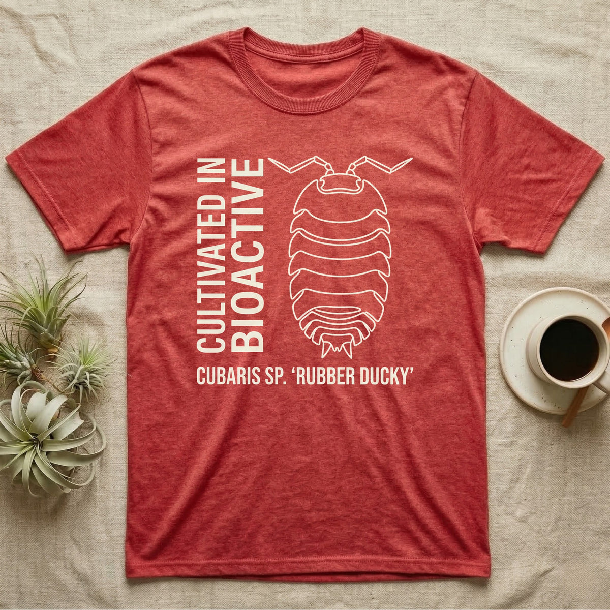Rubber Ducky Isopod Line Art T-Shirt in Heather Red — Bone-white outline drawing of a rubber ducky isopod labelled Cubaris sp. beside vertical stencil type.