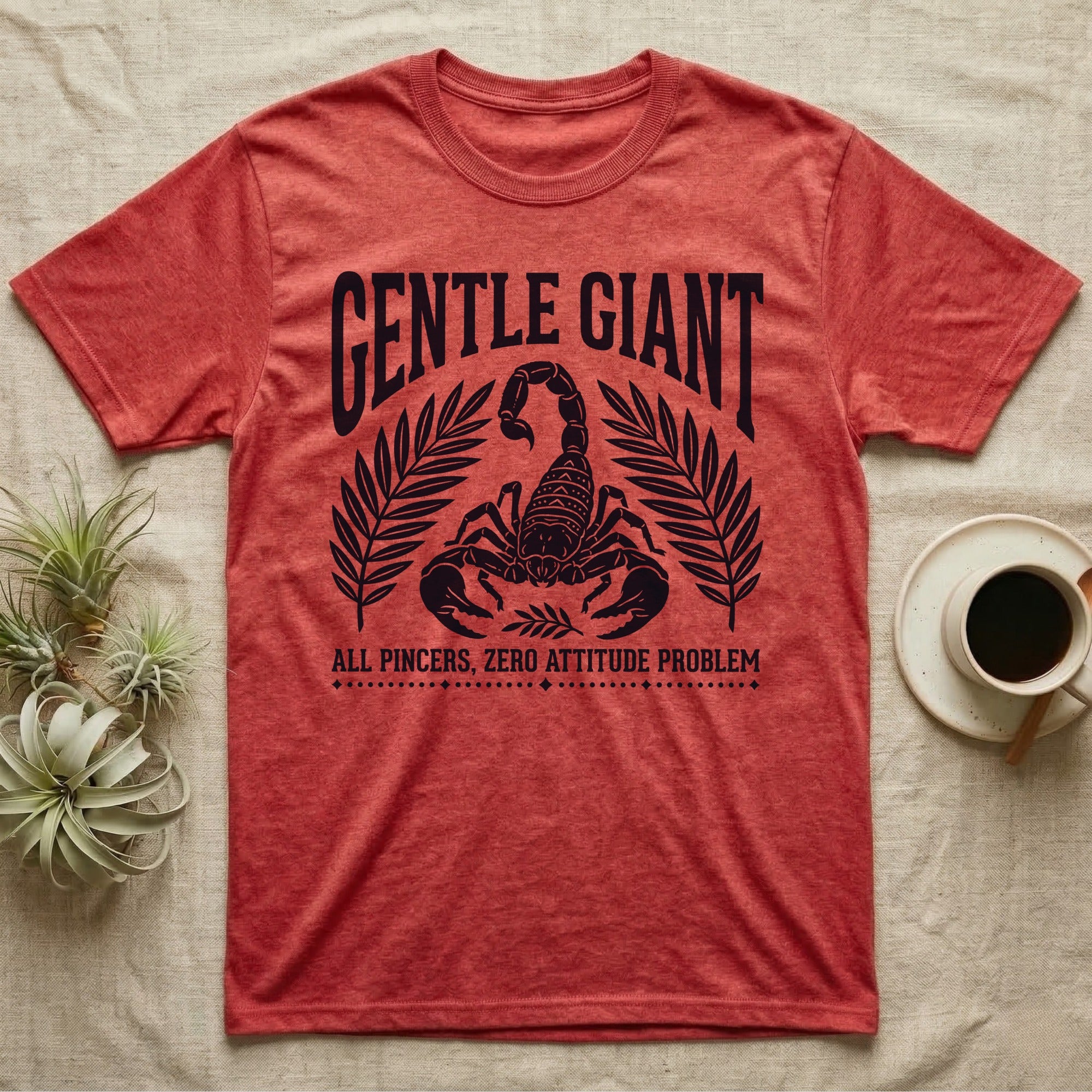 Emperor Scorpion Gentle Giant T-Shirt in Heather Red — Folk woodblock crest of an emperor scorpion under an arched GENTLE GIANT headline, flanked by palm fronds.