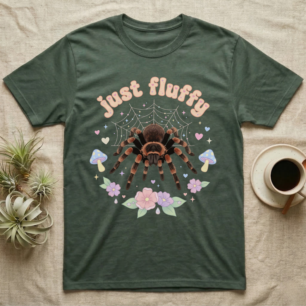 Mexican Redknee Tarantula Baby T-Shirt in Military Green — Fuzzy Mexican redknee tarantula on a pastel web with blossoms under puffy peach bubble text "just fluffy".