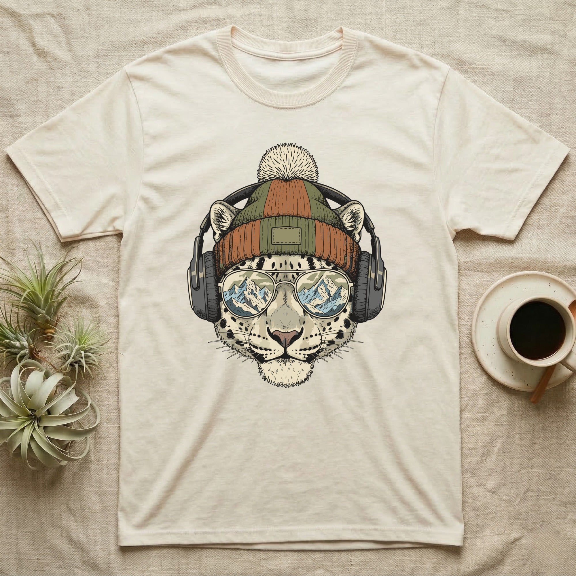 Snow leopard wearing headphones, sunglasses, and beanie, reflected mountains in lenses.